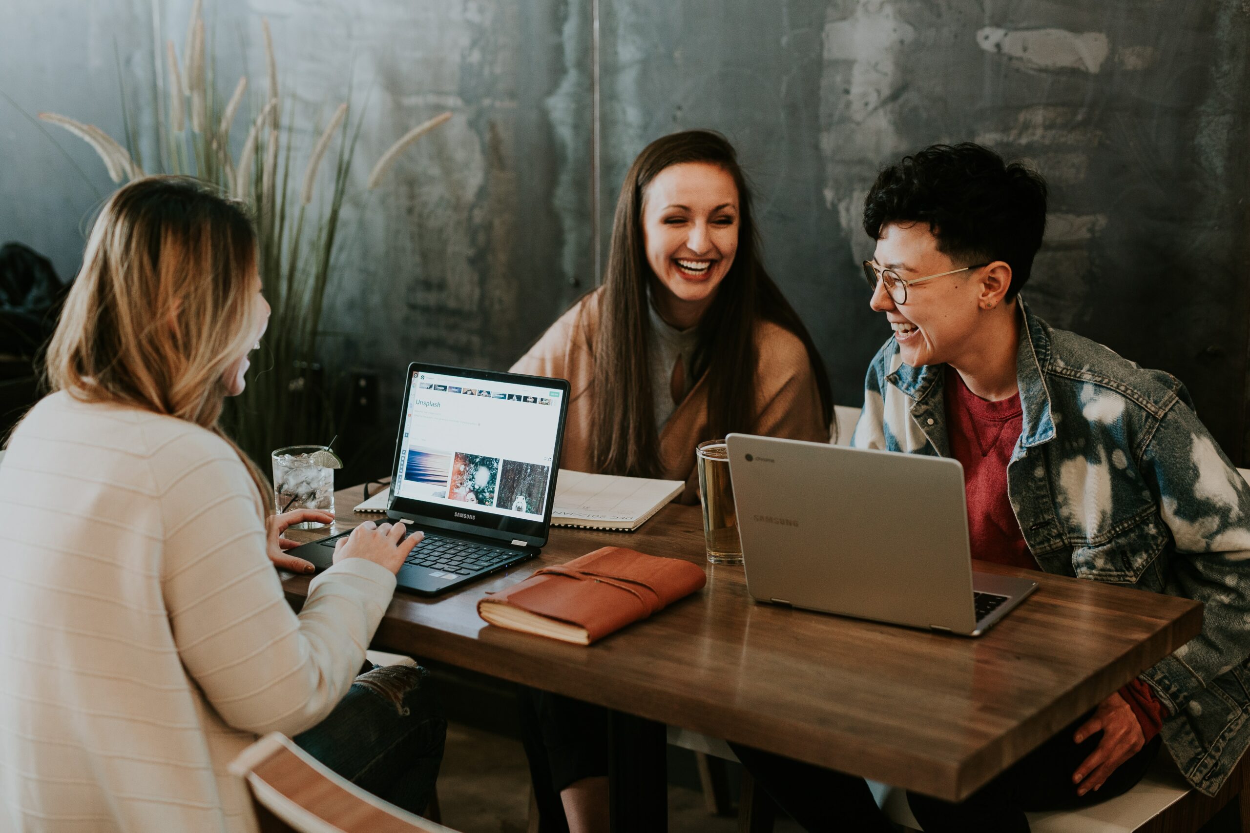 A group of people doing an online course