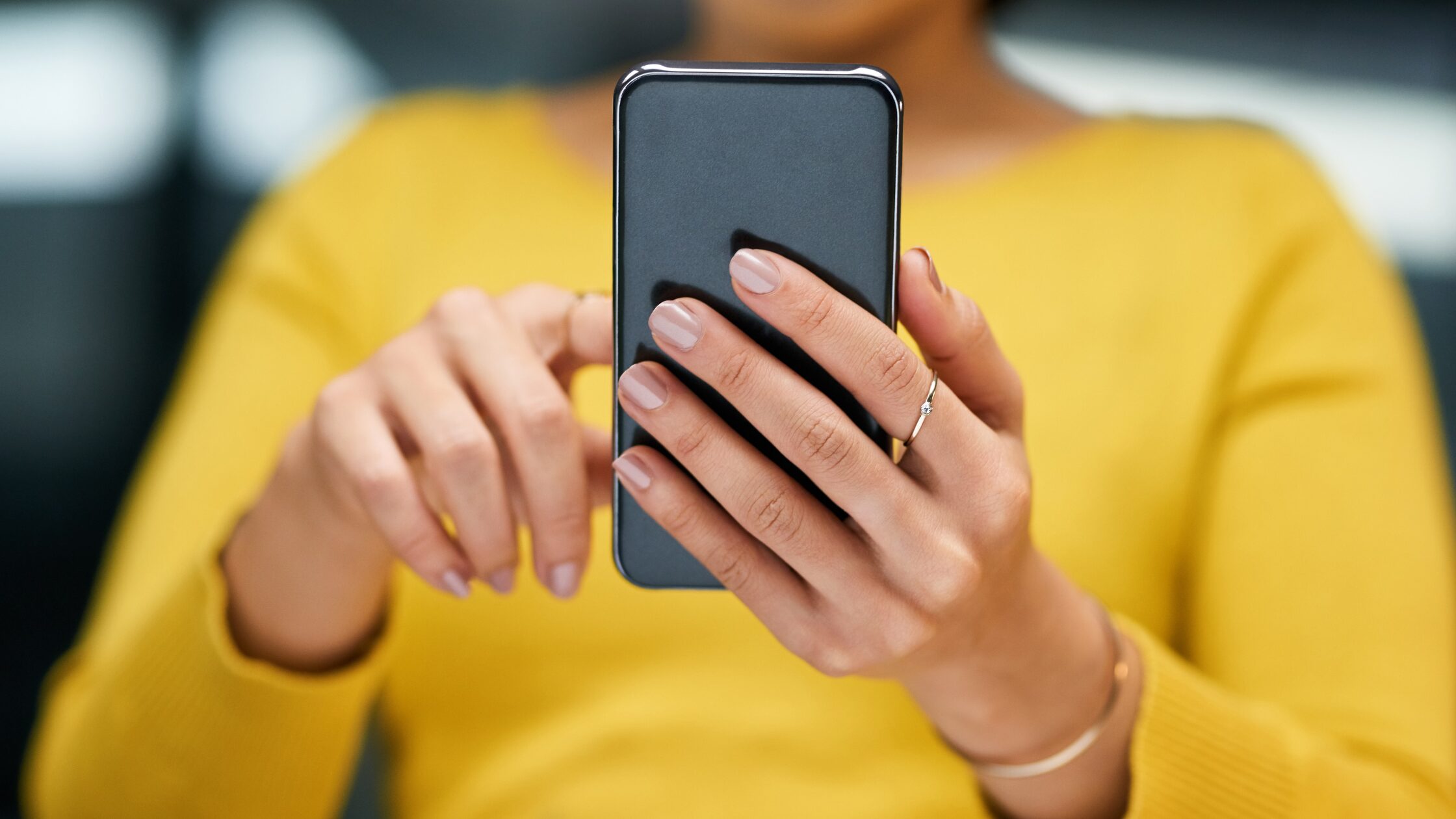Woman scrolling on phone