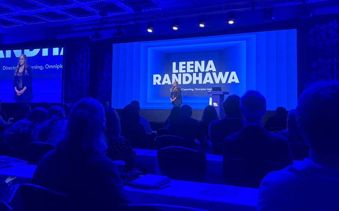 Leena Randhawa presenting on the stage at Articuland London