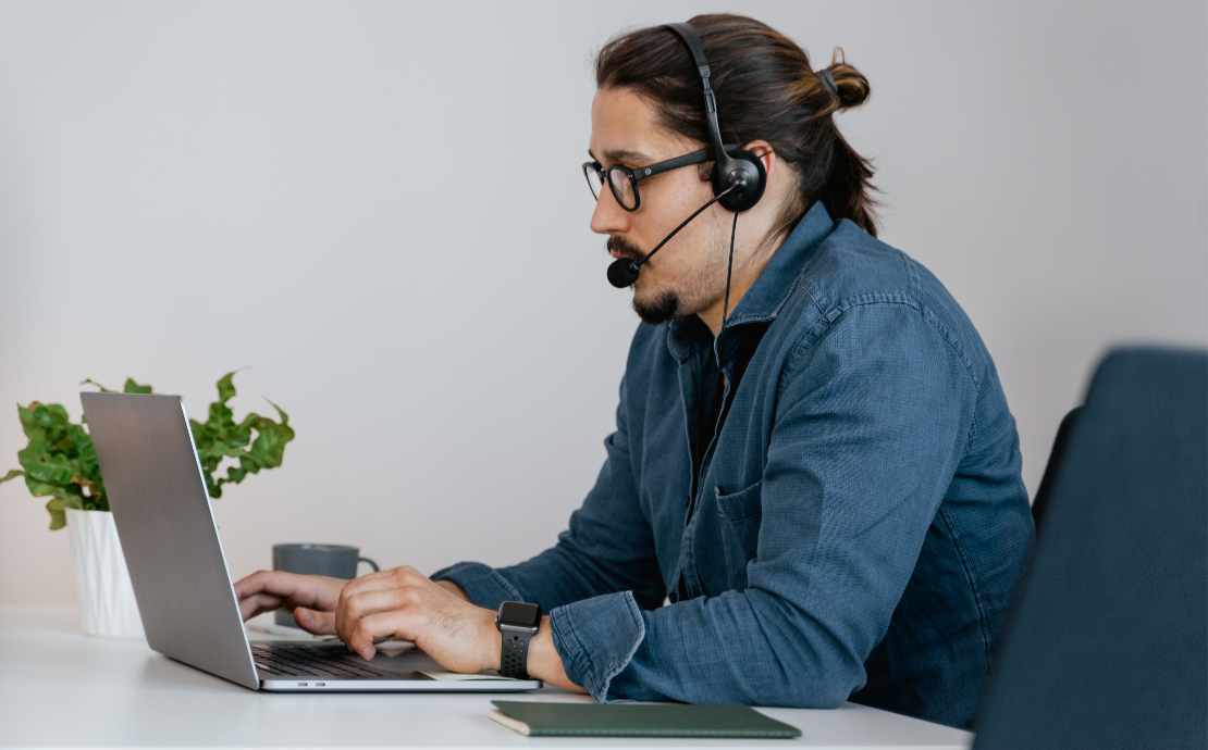 Man wearing a headset on a work call
