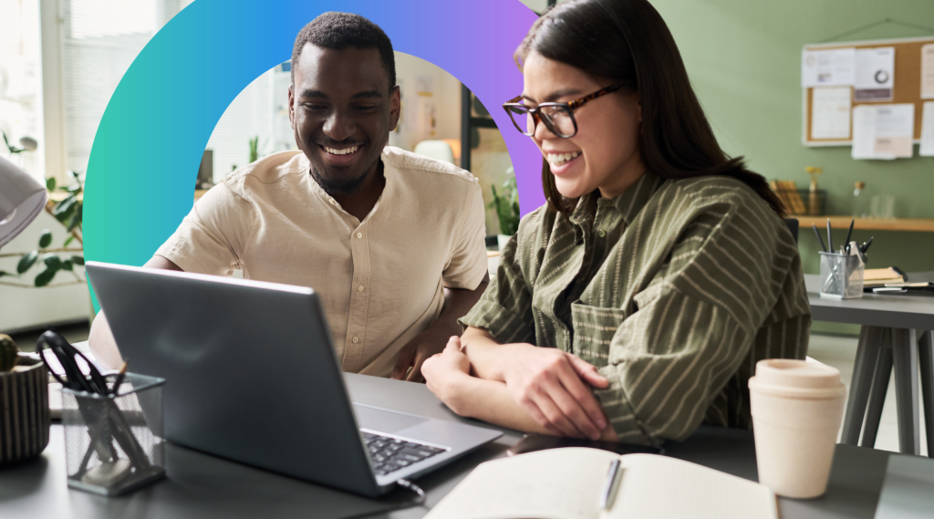 two people looking at laptop